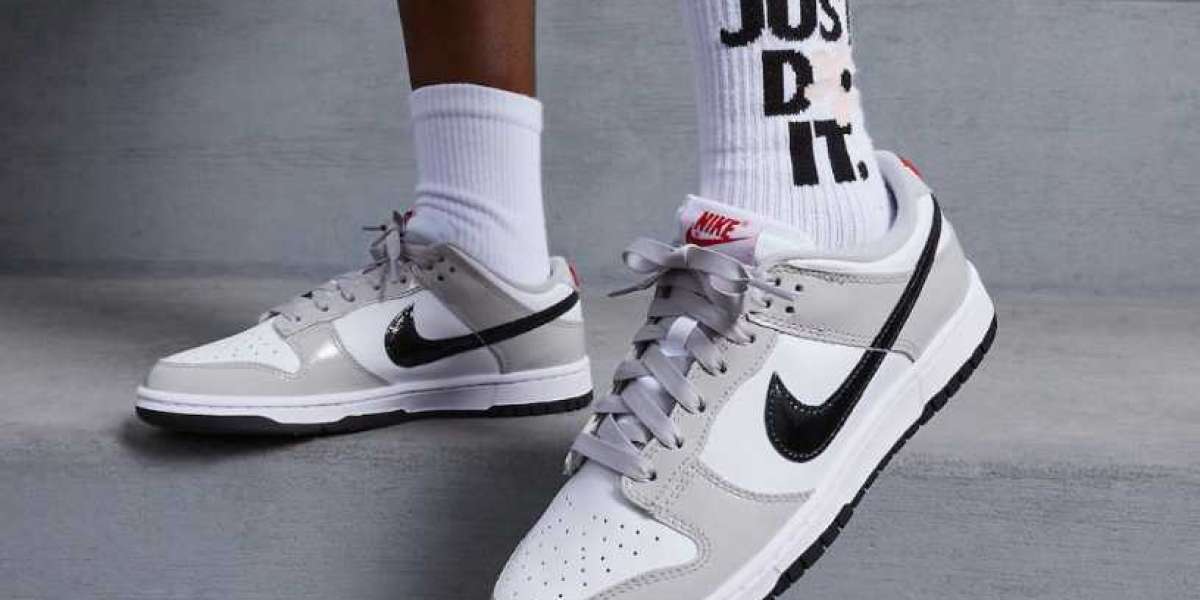 Word feestelijk met de klassieke Nike Dunk Low Light Iron Ore!